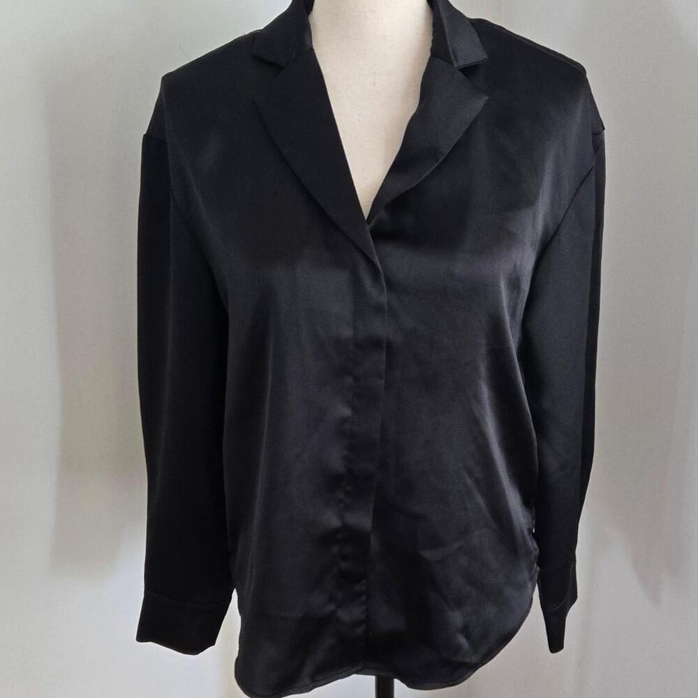 Rachel zoe black silky long sleeve blouse. small snag to front small